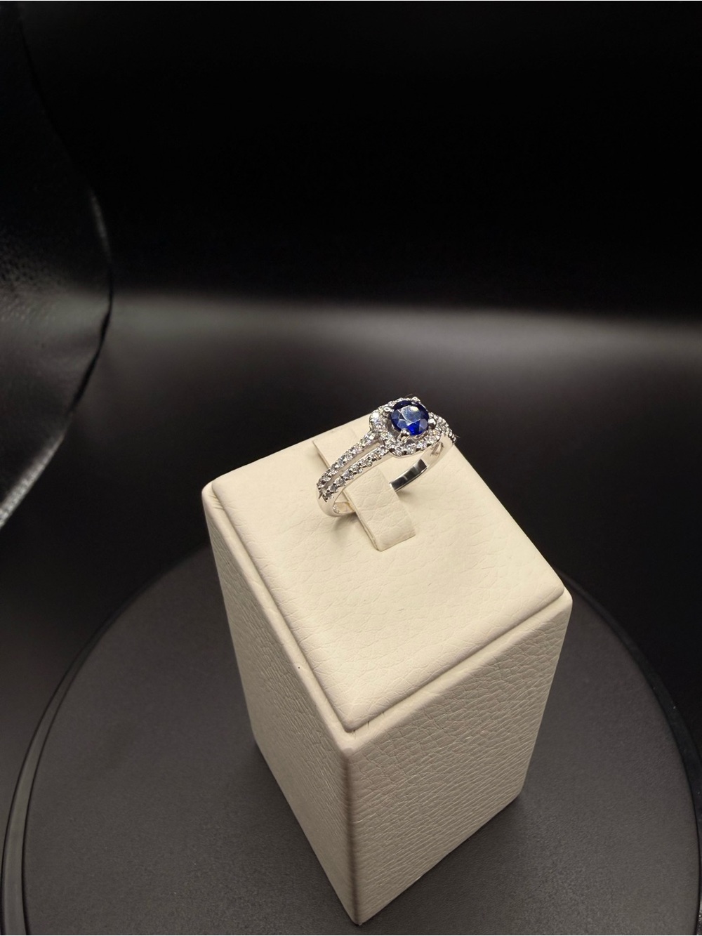Blue Sapphire Halo Ring with Diamond Accents